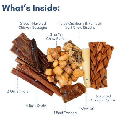 Country Living Bark-Uterie Board dog treat assortment with bully sticks, gullet flats, cow tail, chicken sausages, beef trachea, braided collagen sticks, yak chew puffies, and soft chew biscuits arranged on a rustic wood-look cardboard board.