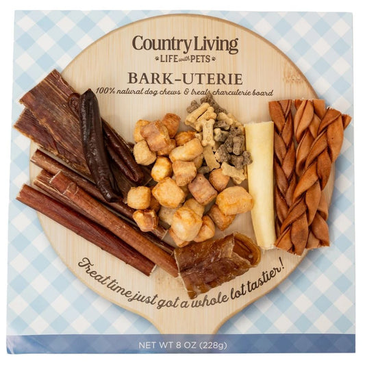 Charcuterie-style natural dog treat board with assorted chews and treats