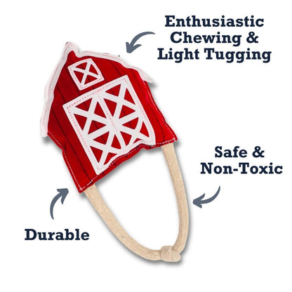 Durable vegan leather dog chew toy shaped like a red barn